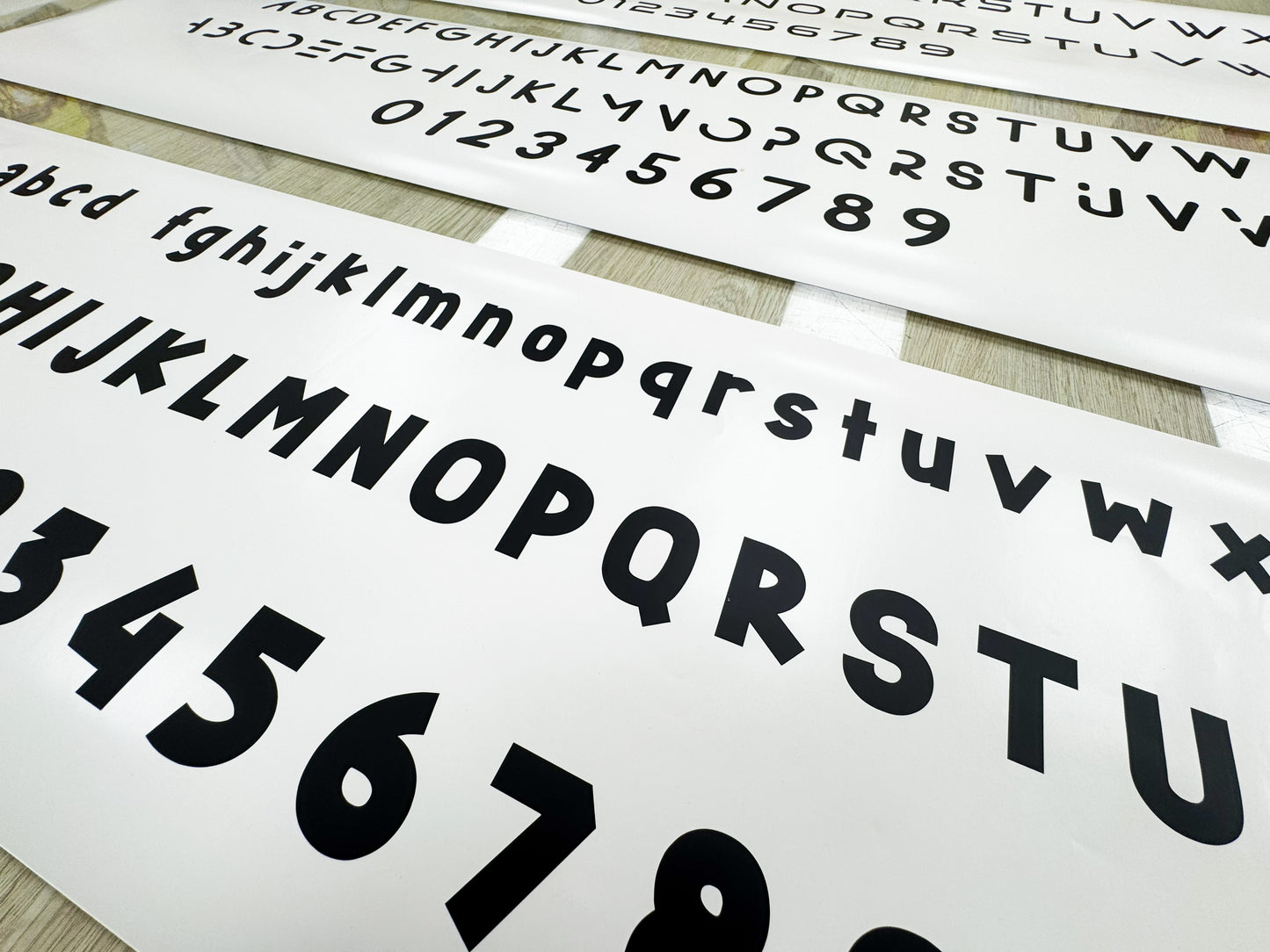 Vinyl letters and numbers for use in making outdoor advertising objects